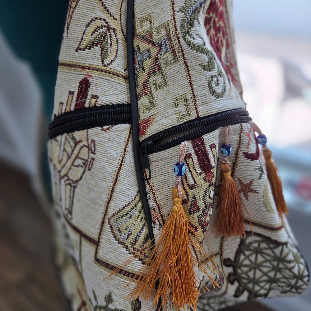 Tapestry sling banana backpack traditional Turkish motif evil eye charms tassels
